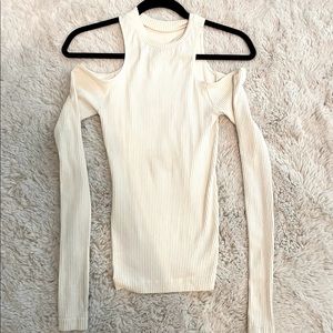 Free People top with shoulder cut outs! Cream